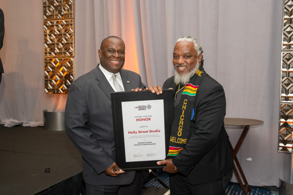 Gary Nelson accepting award from Bryan Hudson at the 2019 Awards Gala